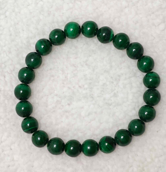 Pierre : Malachite foncée - Qualité : AA - Origine : Congo Taille de perle : 8mm - Forme : Boule Le produit que tu recevras peut différer de la photo de présentation, car chaque pierre naturelle est unique !