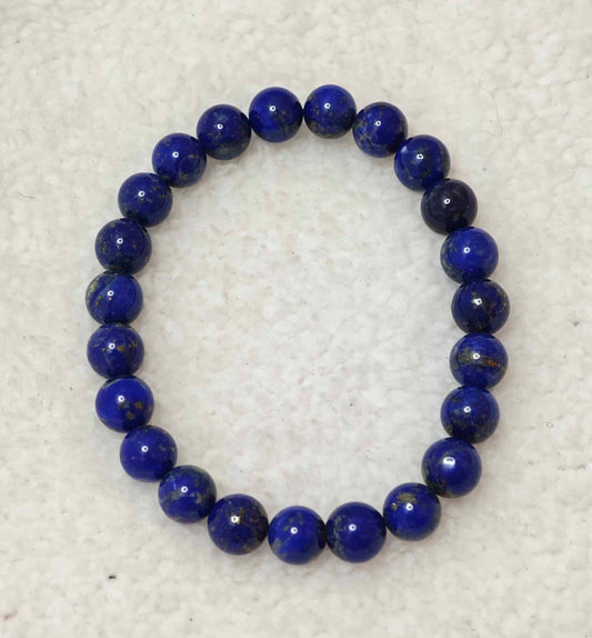 Pierre : Lapis Lazuli - Qualité : AA+ - Origine : Afghanistan Taille de perle : 8mm - Forme : Boule Le produit que tu recevras peut différer de la photo de présentation, car chaque pierre naturelle est unique !